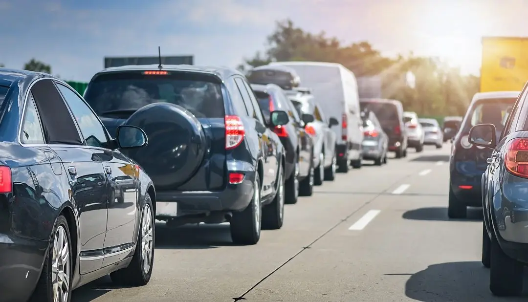 Traffic jam with multiple vehicles on highway.