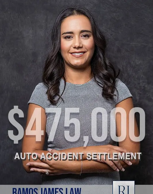Woman smiling with auto accident settlement display.