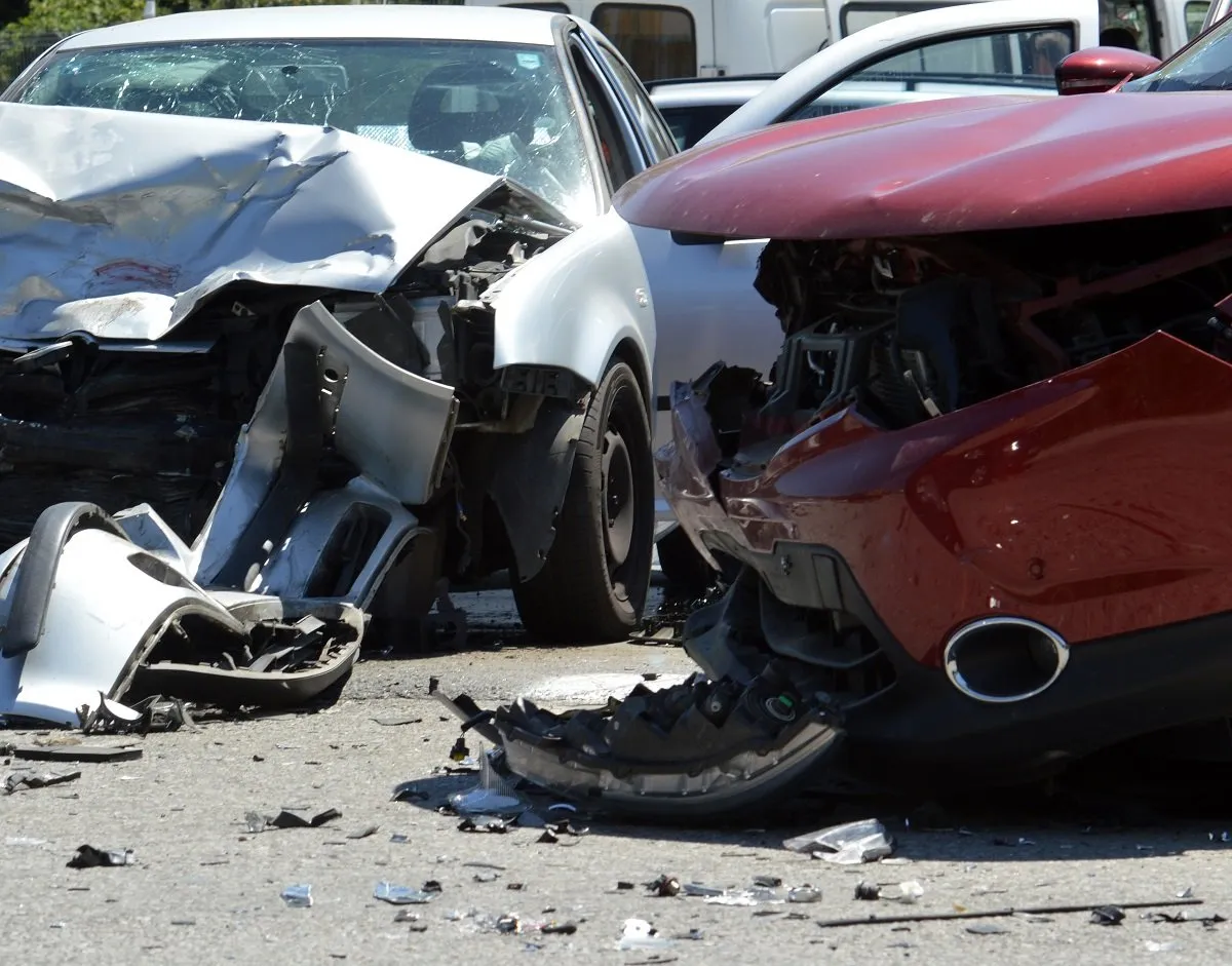 Two severely damaged cars after a collision.