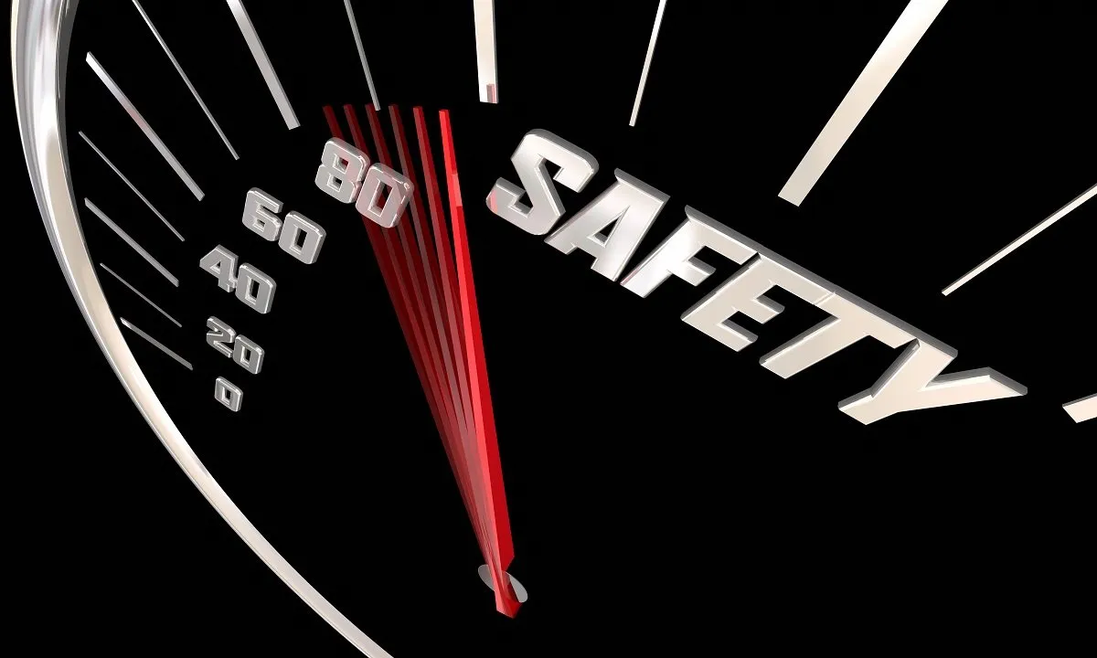 Speedometer needle pointing high toward "SAFETY" zone.