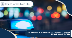 The blue flashing light on top of a police car at night.