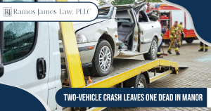 A silver sedan with the roof cut off is on the bed of a large truck.