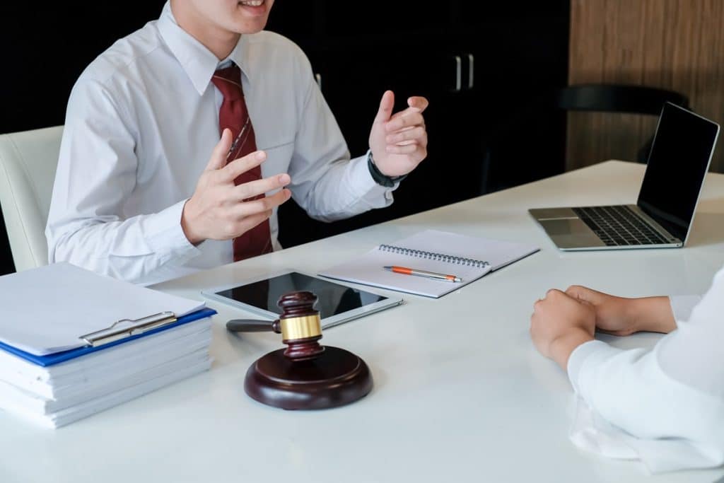 Lawyer consulting with his client